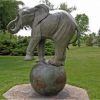 Скульптура из металла " Слон на Земном Шаре " .